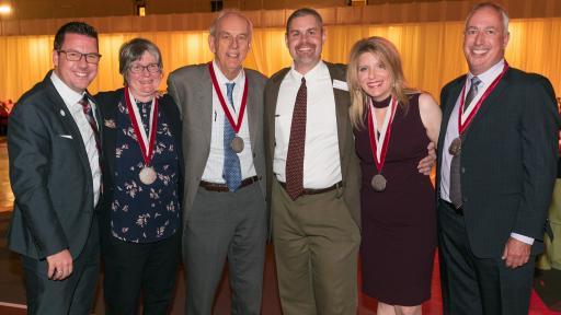 North Central College honored donors wearing medals.